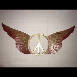 Wrought iron angel wings art